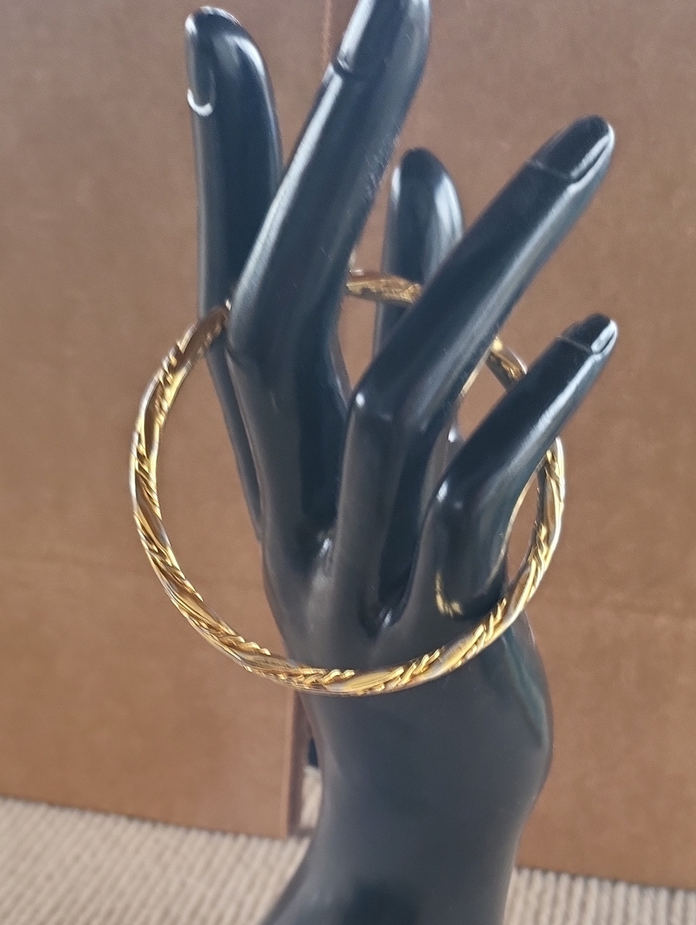 Monet Gold Tone Twisted Bangle Bracele